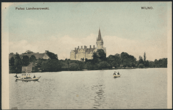 Hand-tinted postcard showing a palace with spire beyond a lake, rowing boats with passengers on water